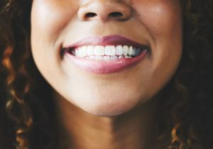 cropped image of woman smiling with pretty white smile general dentistry dentist in Frederick Maryland
